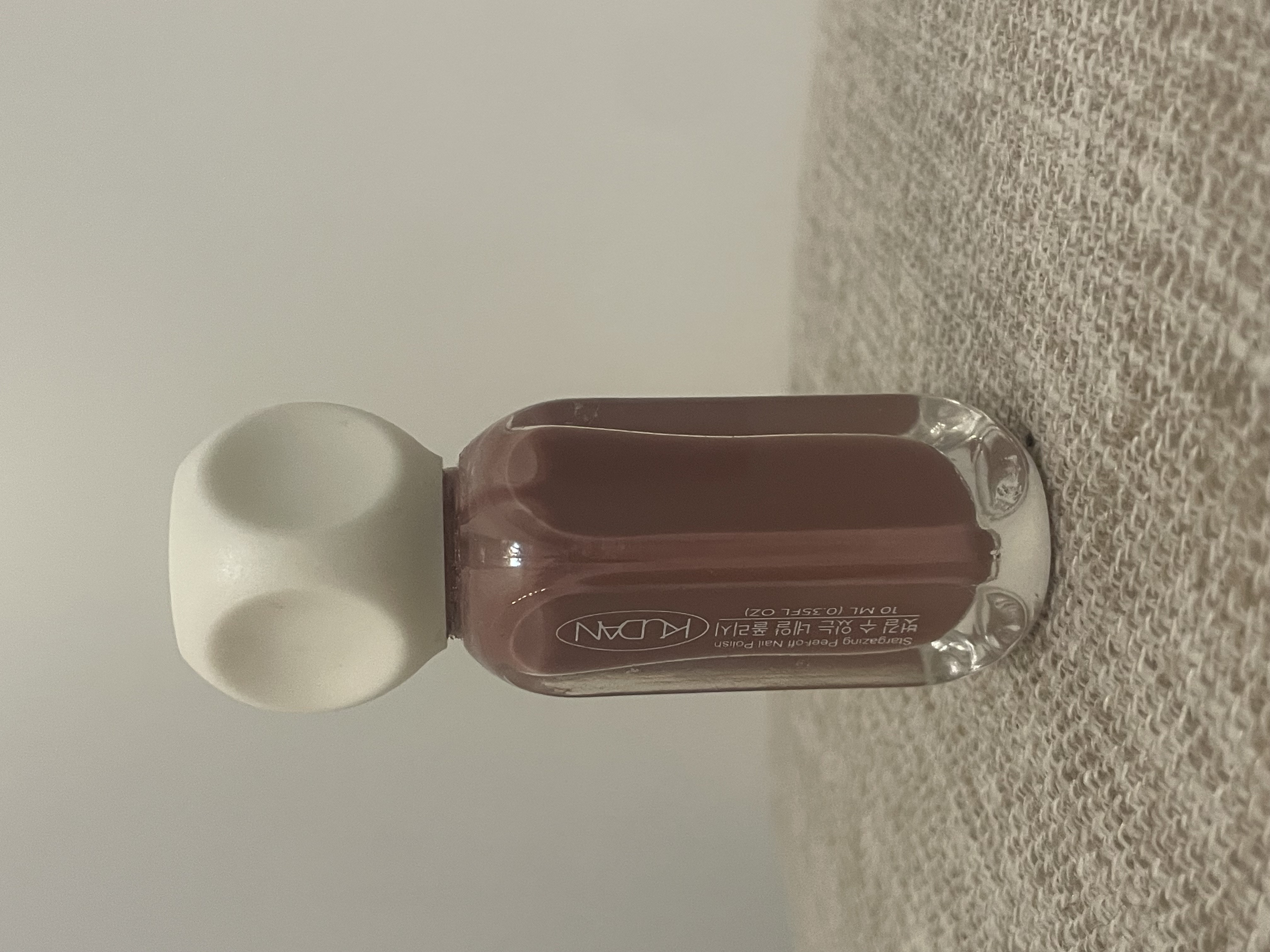 Side View 2 of Real Nail Polish Bottle